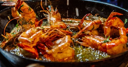 Seafood cooking on a wok